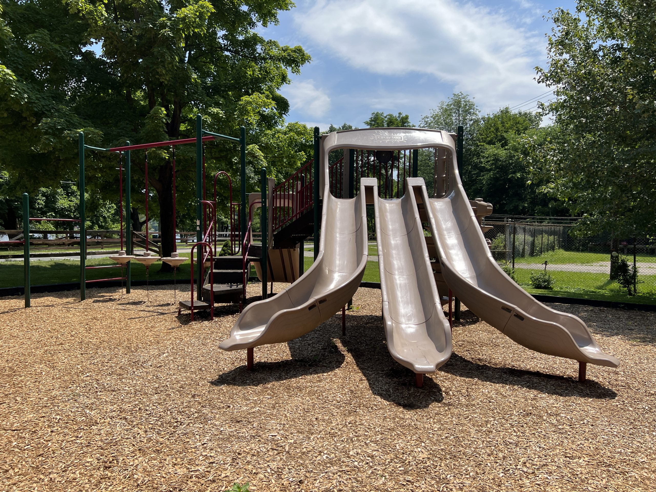 Lake Musconetcong Park Playground in Stanhope NJ - SLIDES - 3 side by side slides with climbing feature front WIDE image