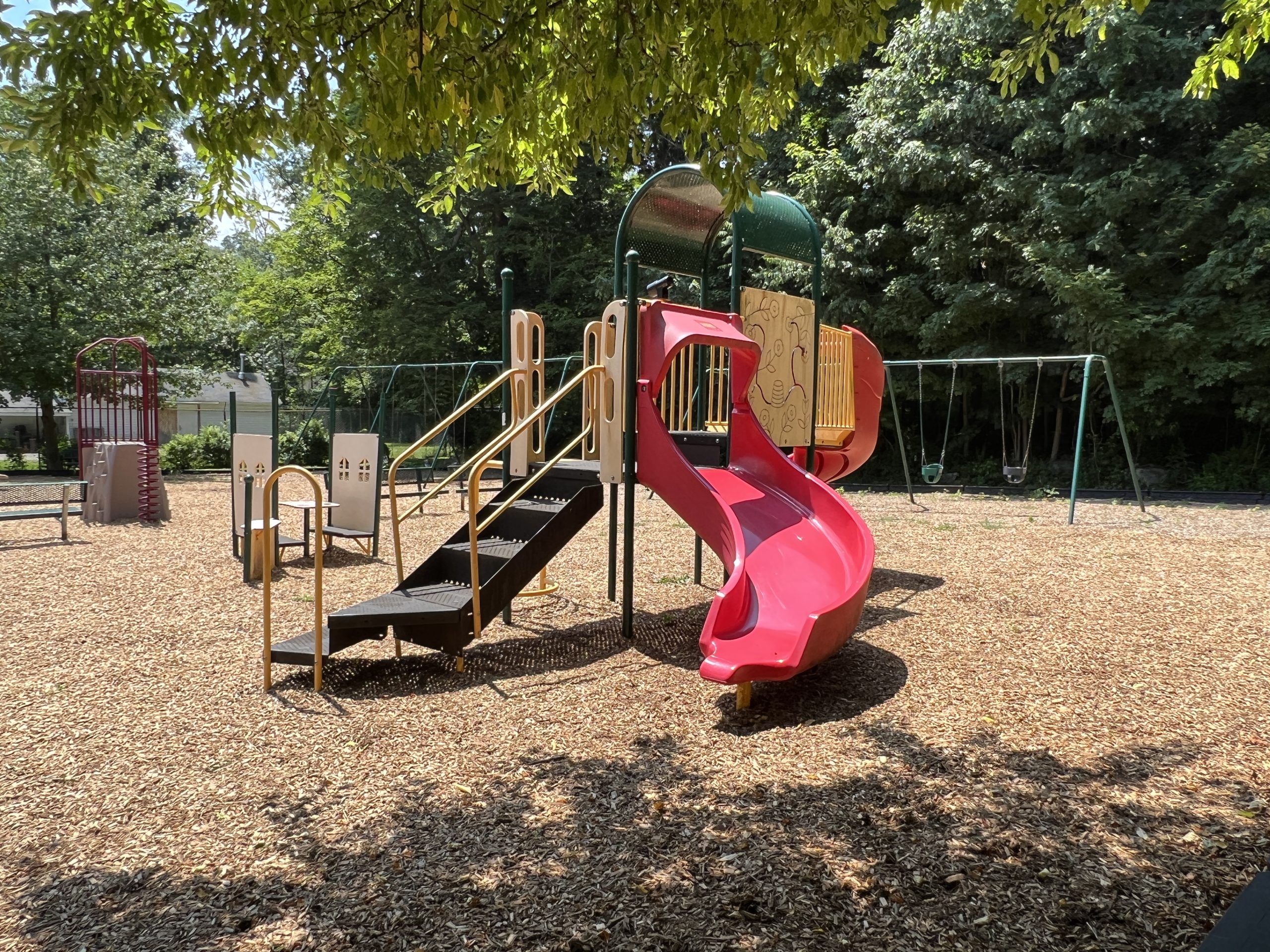 Lake Musconetcong Park Playground in Stanhope NJ - SLIDES - Red wide curvy slide WIDE image
