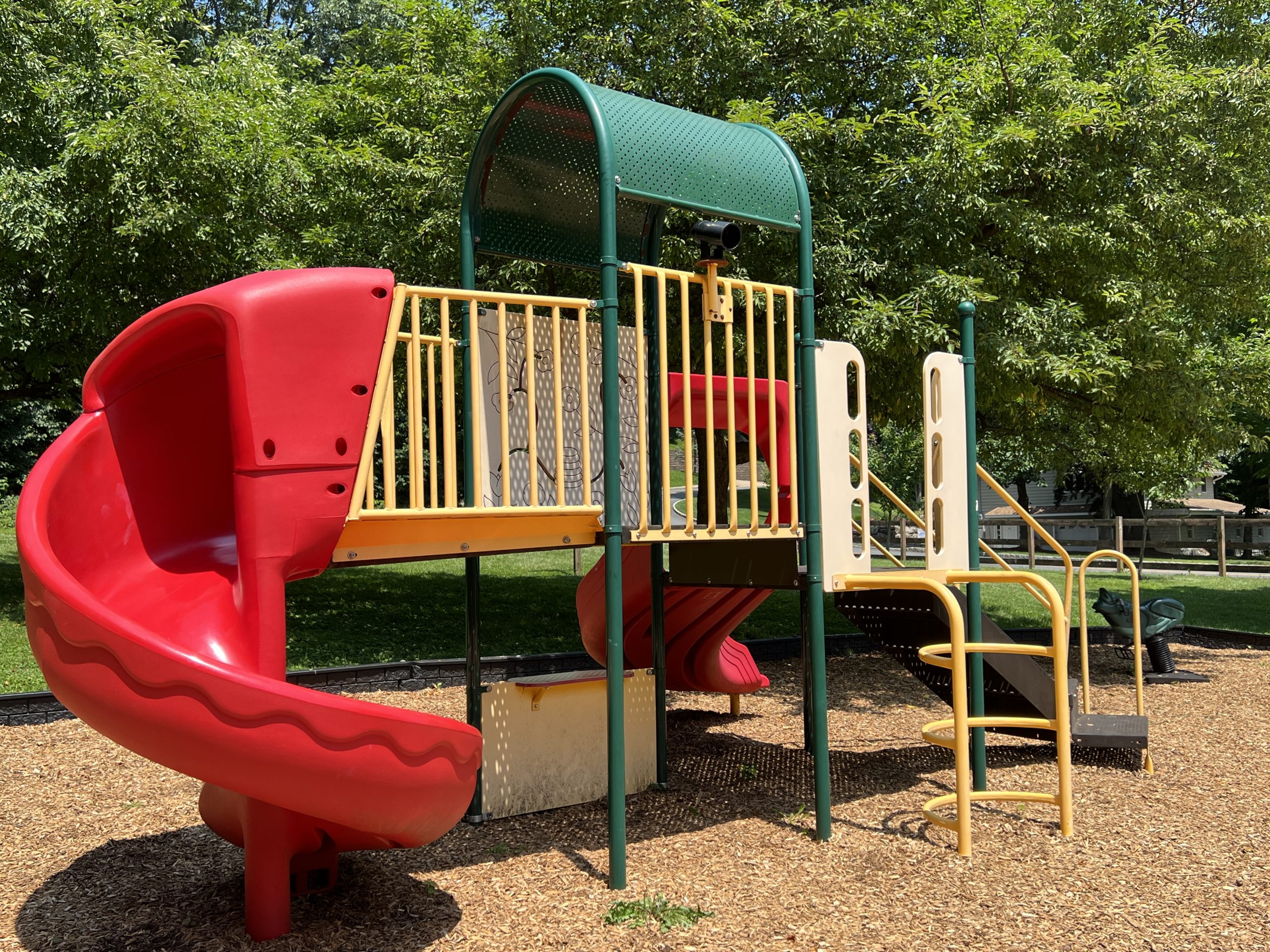 Lake Musconetcong Park Playground in Stanhope NJ - WIDE image - red slide structure with red twisting SLIDE opposite side