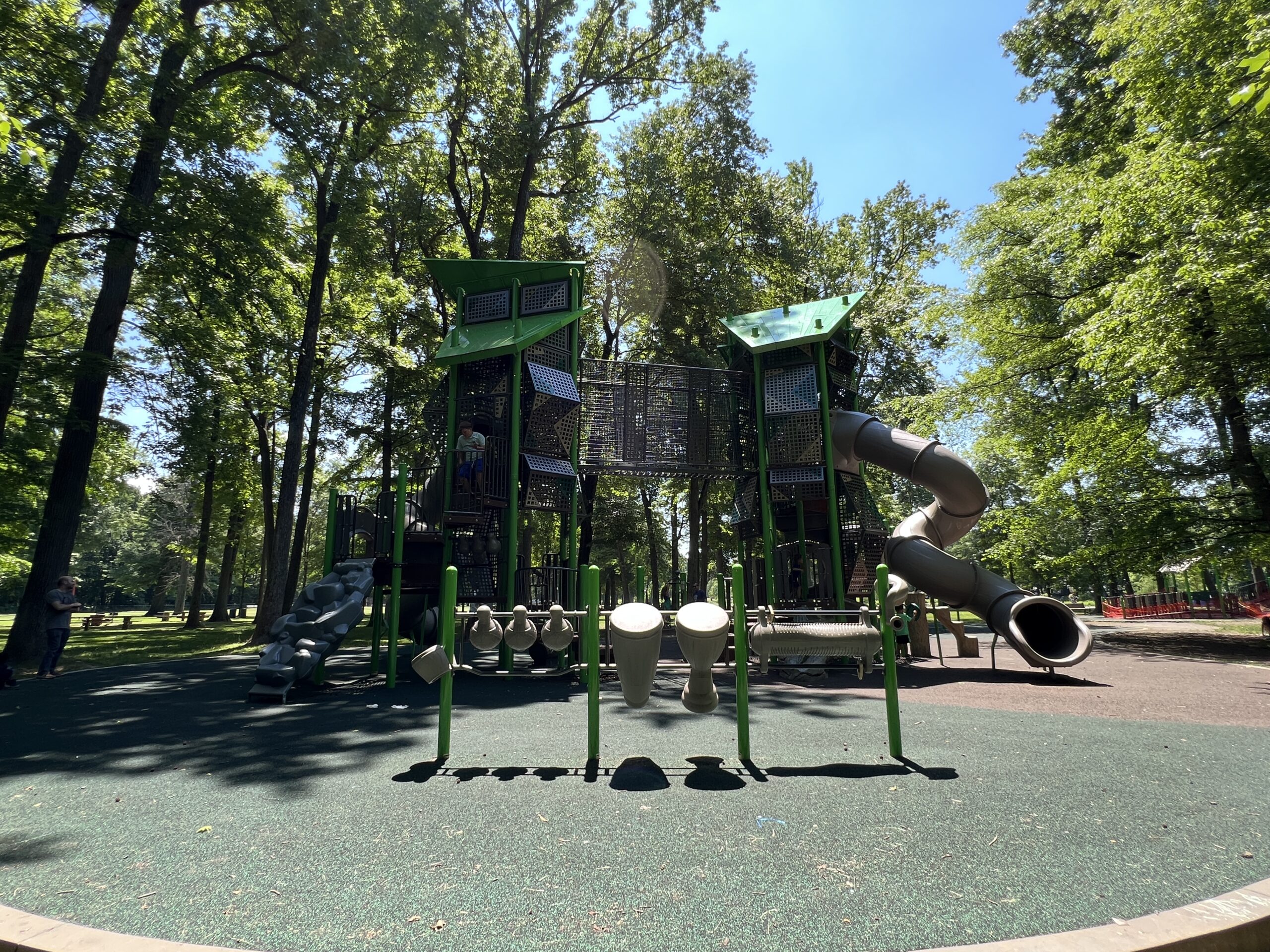Nomahegan Park Playground in Cranford NJ - WIDE image - large structure side view with musical instruments