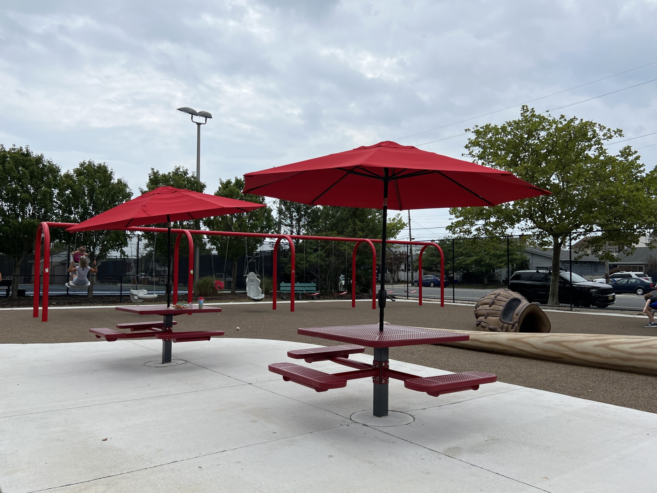 Picnic tables at playground at Baby Lucy Playground in Margate NJ