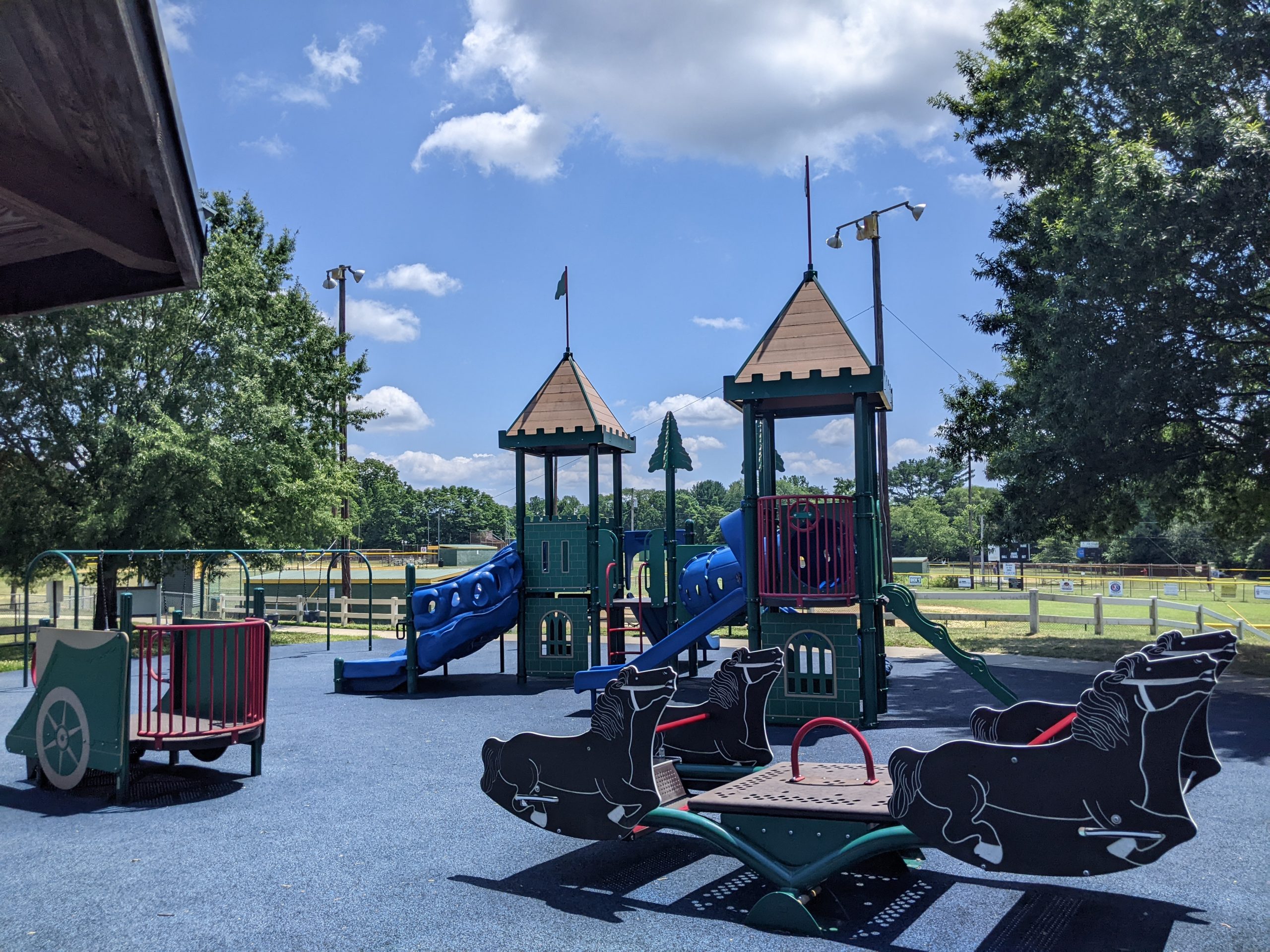 WIDE view of 2-5 Playground with seesaw with horses at Imagination Kingdom in Pemberton Township NJ