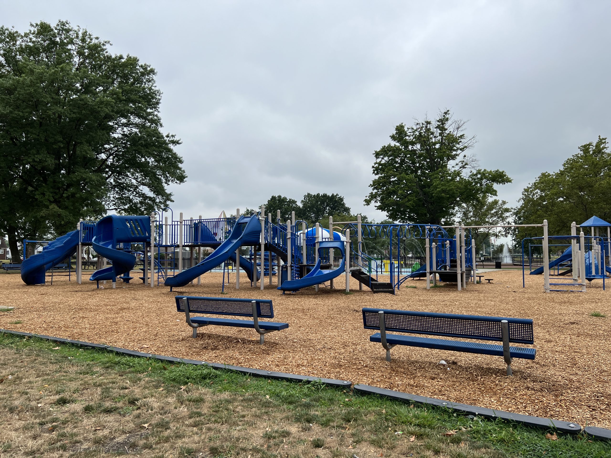 WIDE view of playground grass view END at Carteret Park Playground in Carteret NJ