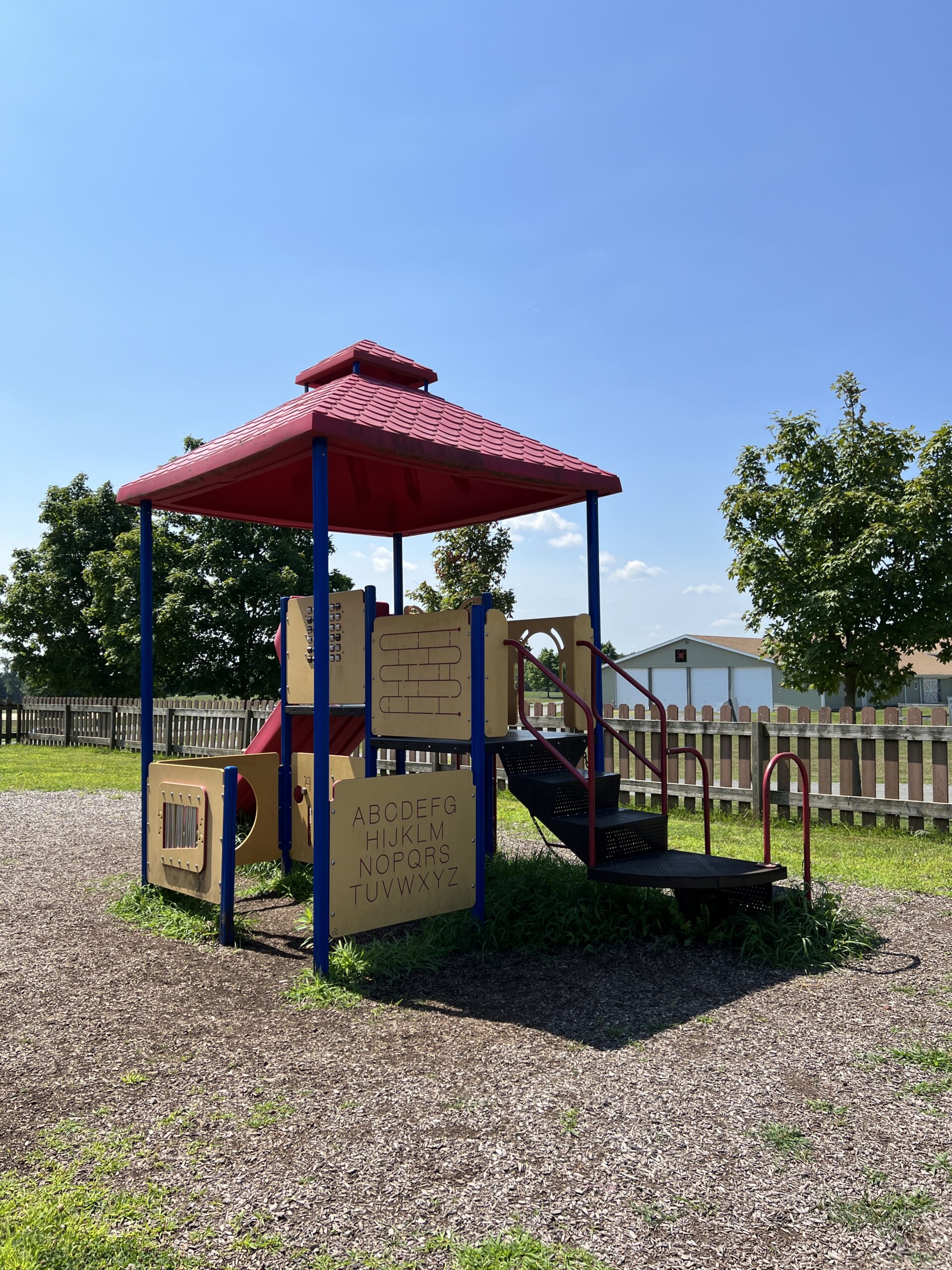 Alexandria Township Park Playground in Milford NJ - Tall image - red roof playground ABC side