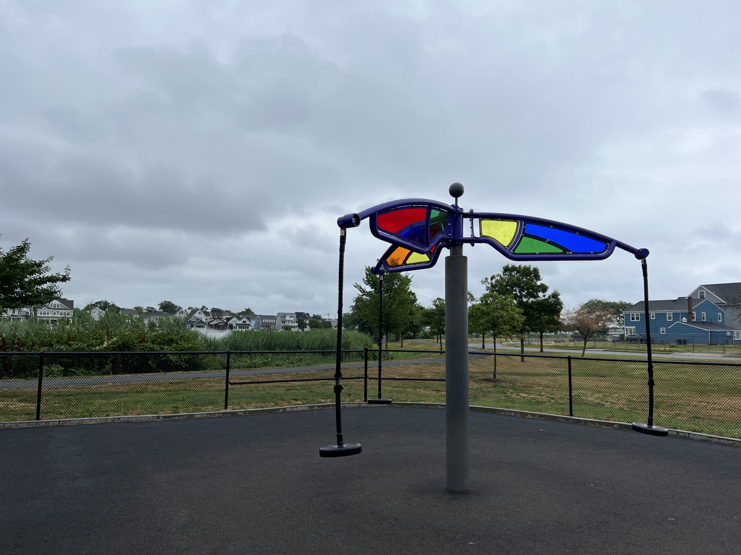 Features - Colorful human mobile WIDE image at Jane Magovern's Playground in Belmar NJ