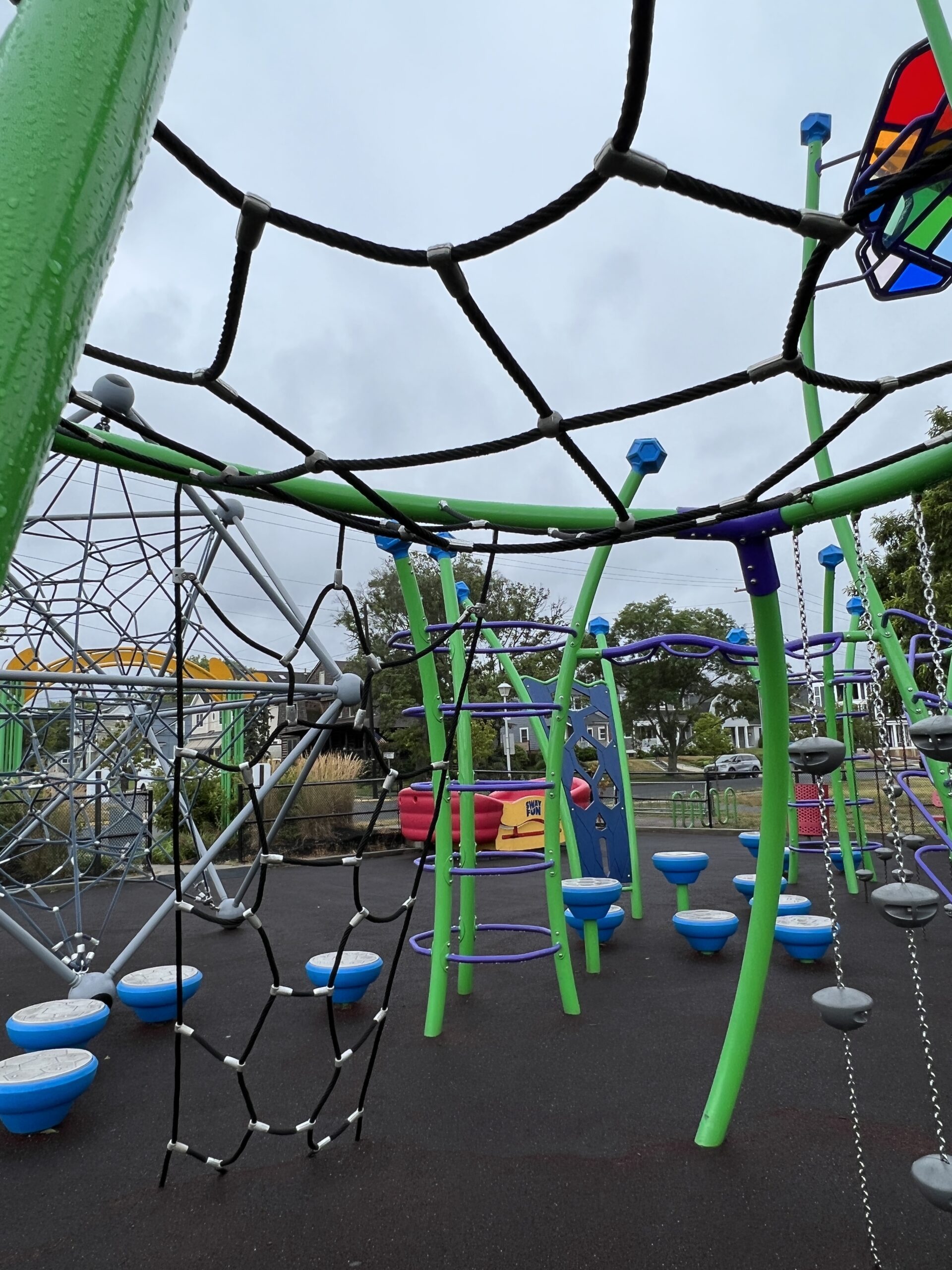 Features - Green climbing structure INSIDE TALL image at Jane Magovern's Playground in Belmar NJ