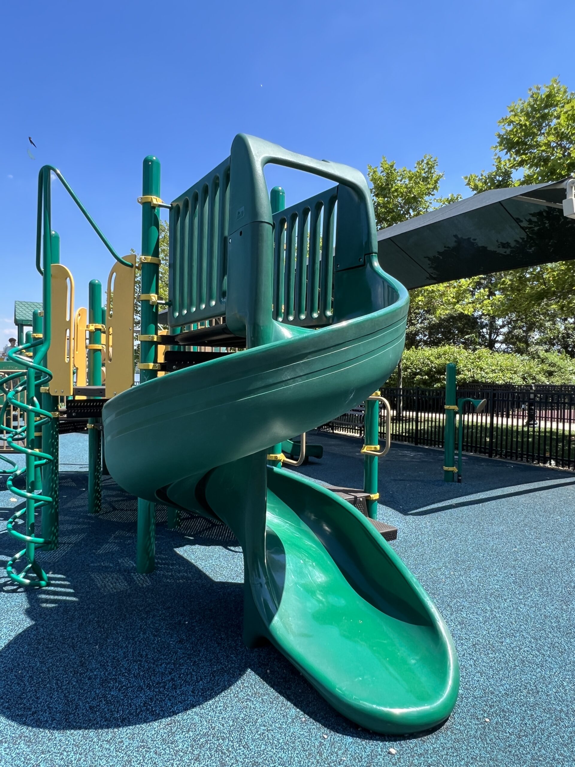 Maxwell Place Park Playground in Hoboken NJ - SLIDE - twisting slide TALL image