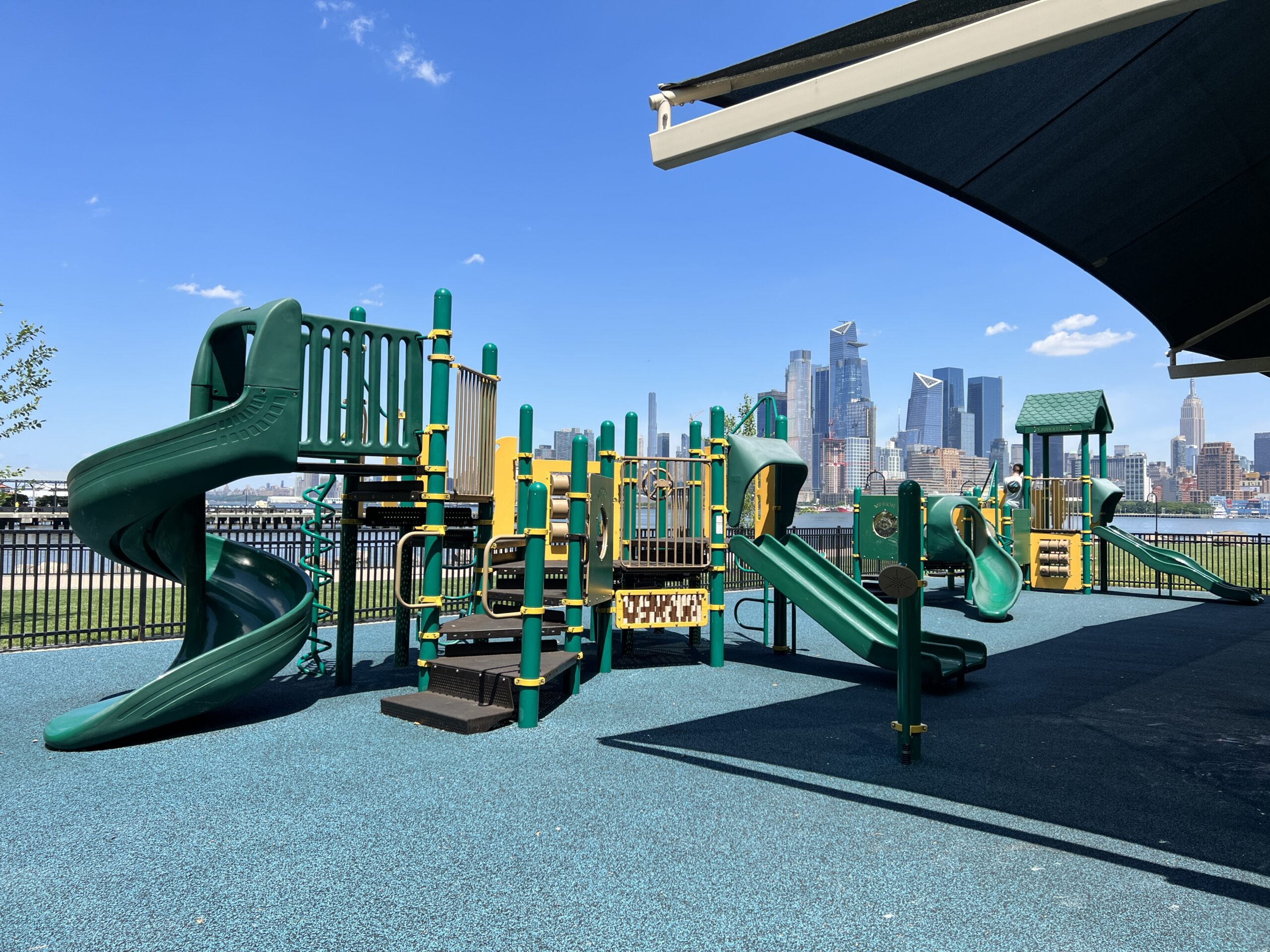 Maxwell Place Park Playground in Hoboken NJ - WIDE image - both playgrounds front side view