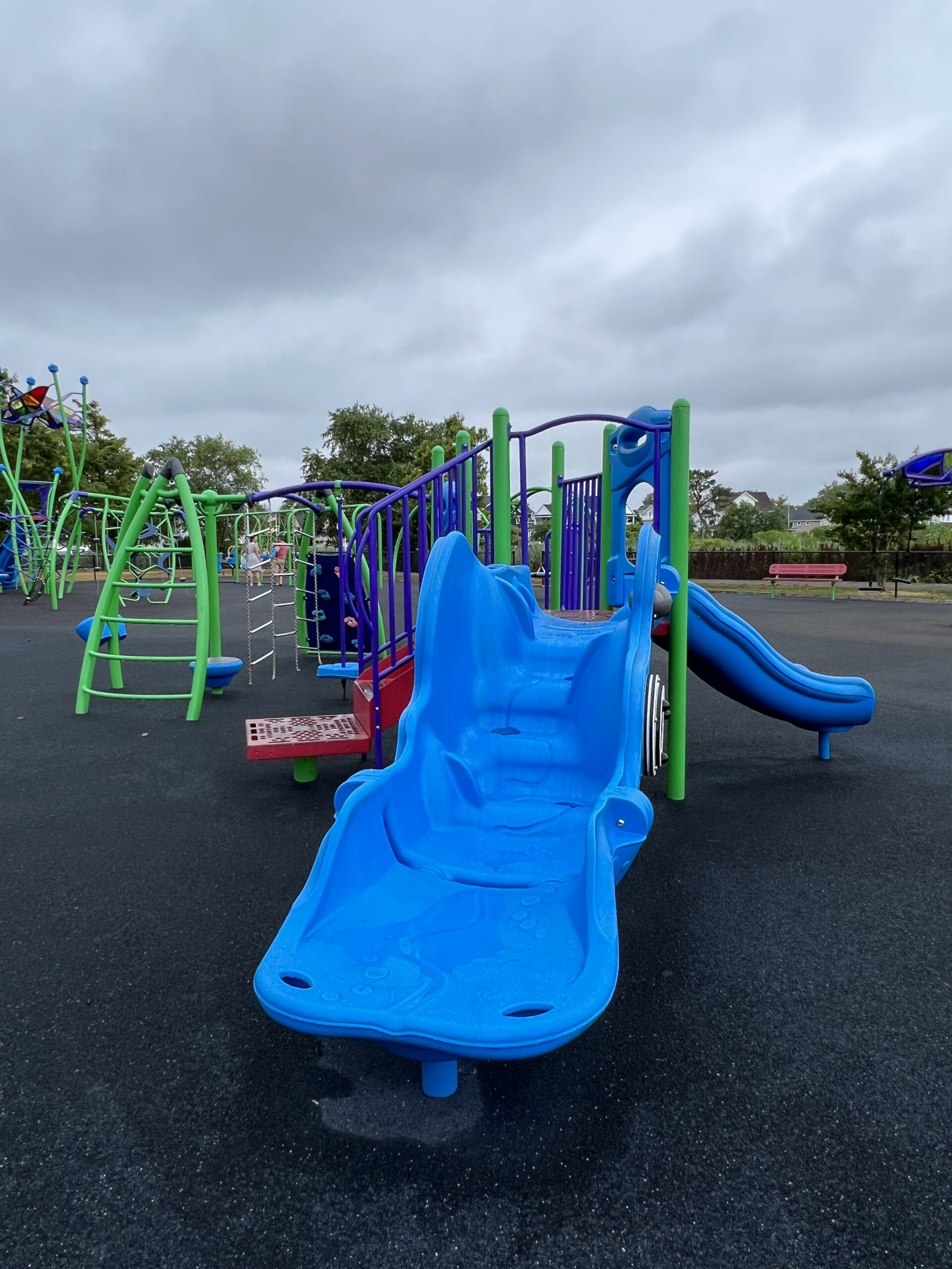 SLIDES - bumpy slide on preschool playground TALL image at Jane Magovern's Playground in Belmar NJ
