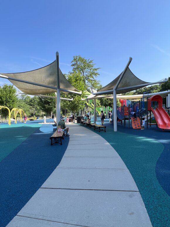 Verona Park Playground in Verona NJ - SHADY - tall image of canopies over benches