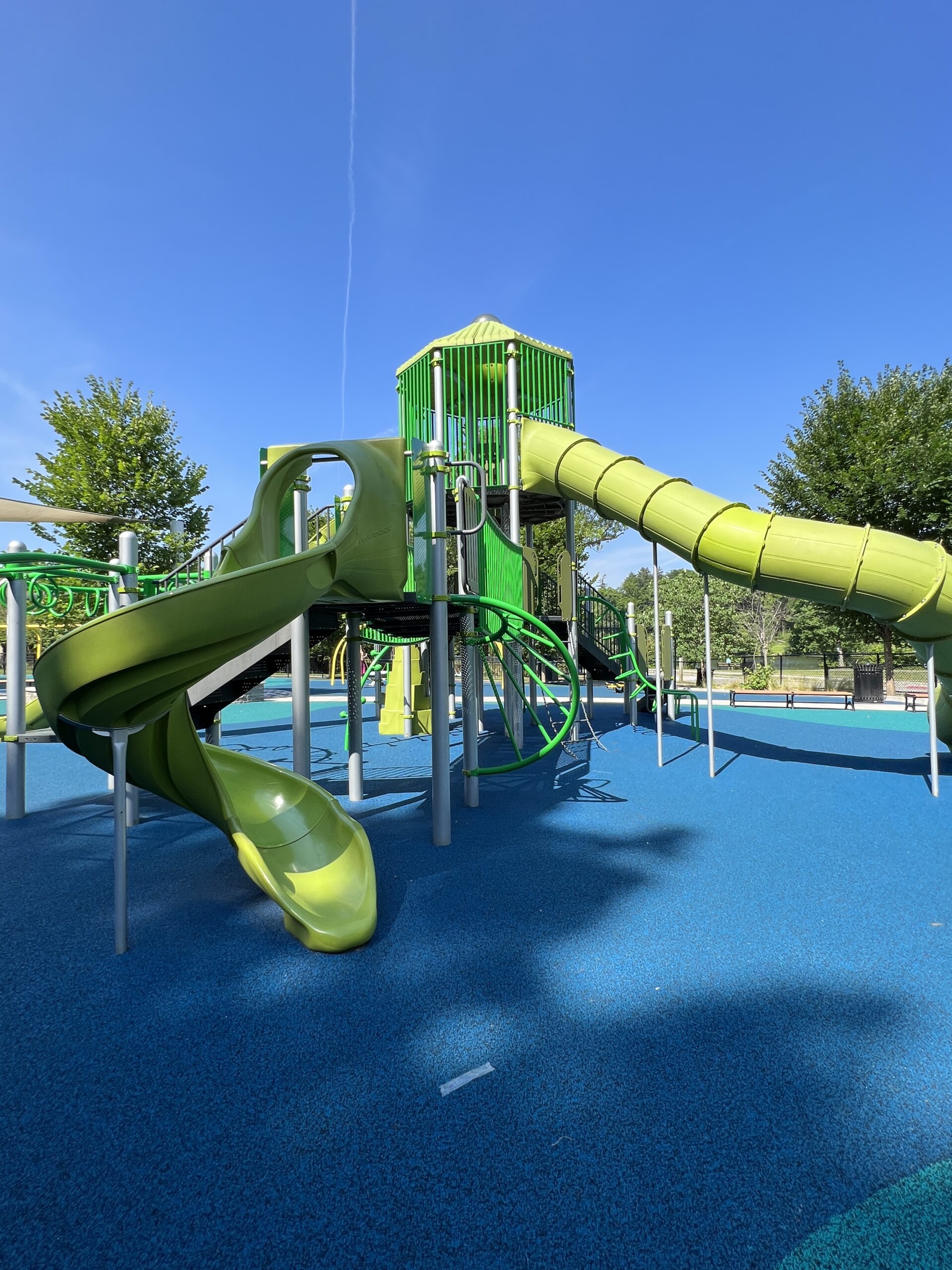 Verona Park Playground in Verona NJ - SLIDES - open twisting green slide TALL image