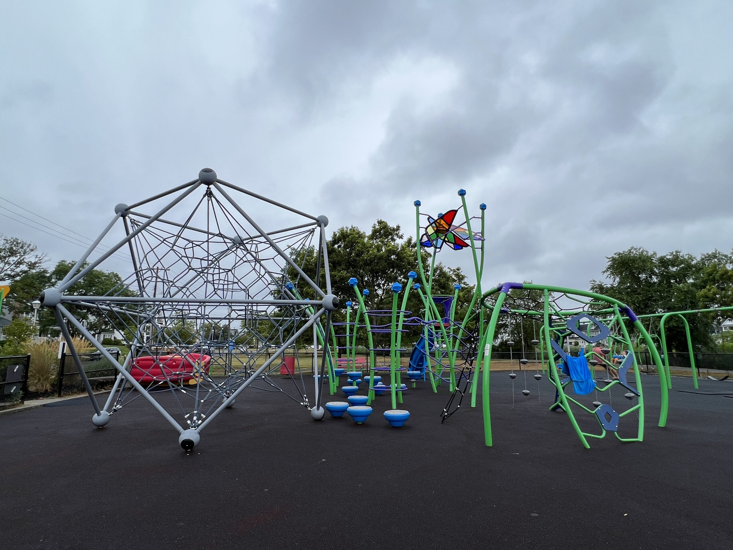 WIDE image - climbing spider web with other climbing structures at Jane Magovern's Playground in Belmar NJ