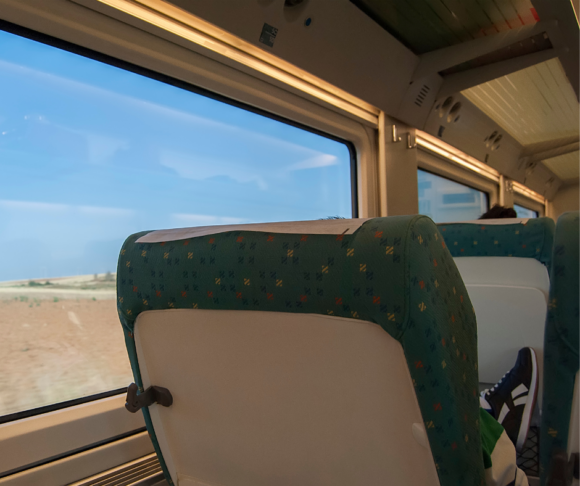seats and window on commuter trains
