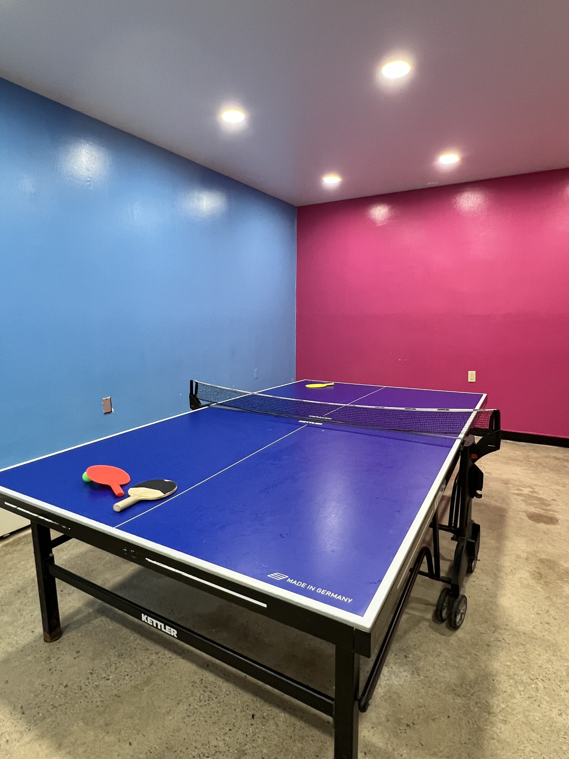 ping pong table at indoor pool at Cartoon Network Hotel in Lancaster portrait image 1
