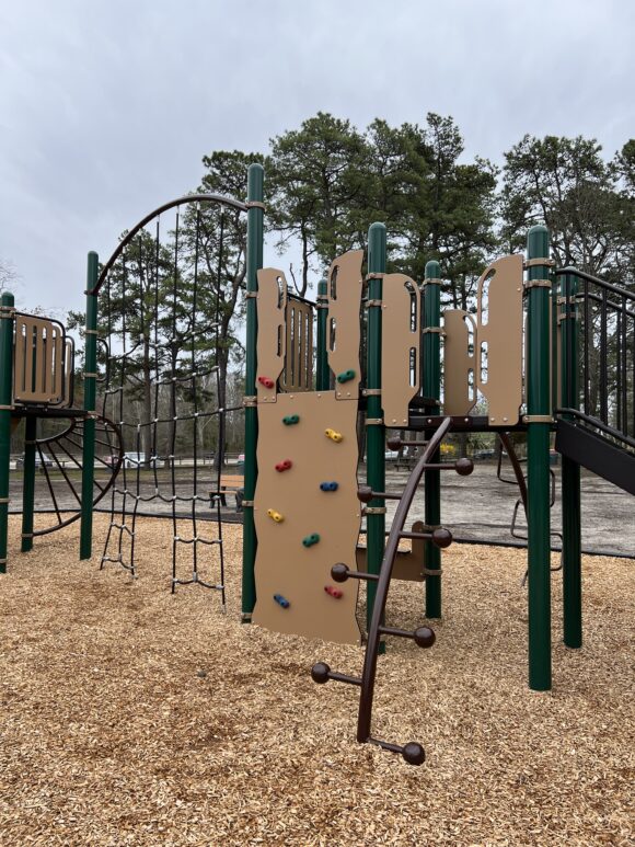 Climbing Wall on larger structure at Birch Grove Park Playground in Northfield NJ PORTRAIT image