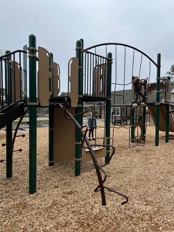 Climbing ladder on larger structure at Birch Grove Park Playground in Northfield NJ PORTRAIT image