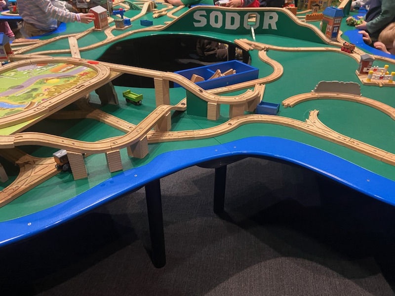 Thomas the Train train tracks table at the Thomas & Friends: Explore the Rails a Liberty Science Center Museum exhibit.