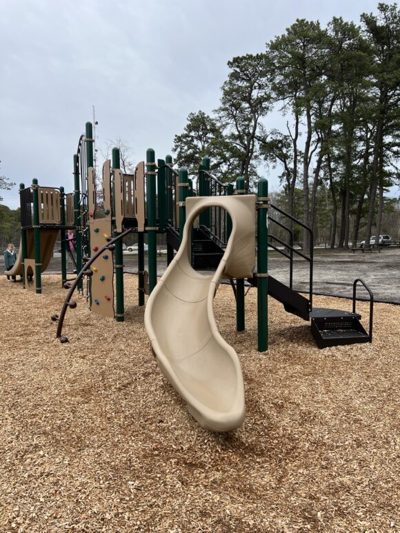 Twisty SLIDE on bigger structure Birch Grove Park Playground in Northfield NJ PORTRAIT image