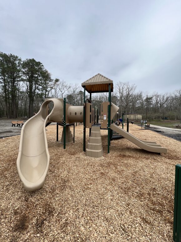 twisty SLIDE on smaller structure Birch Grove Park Playground in Northfield NJ PORTRAIT image