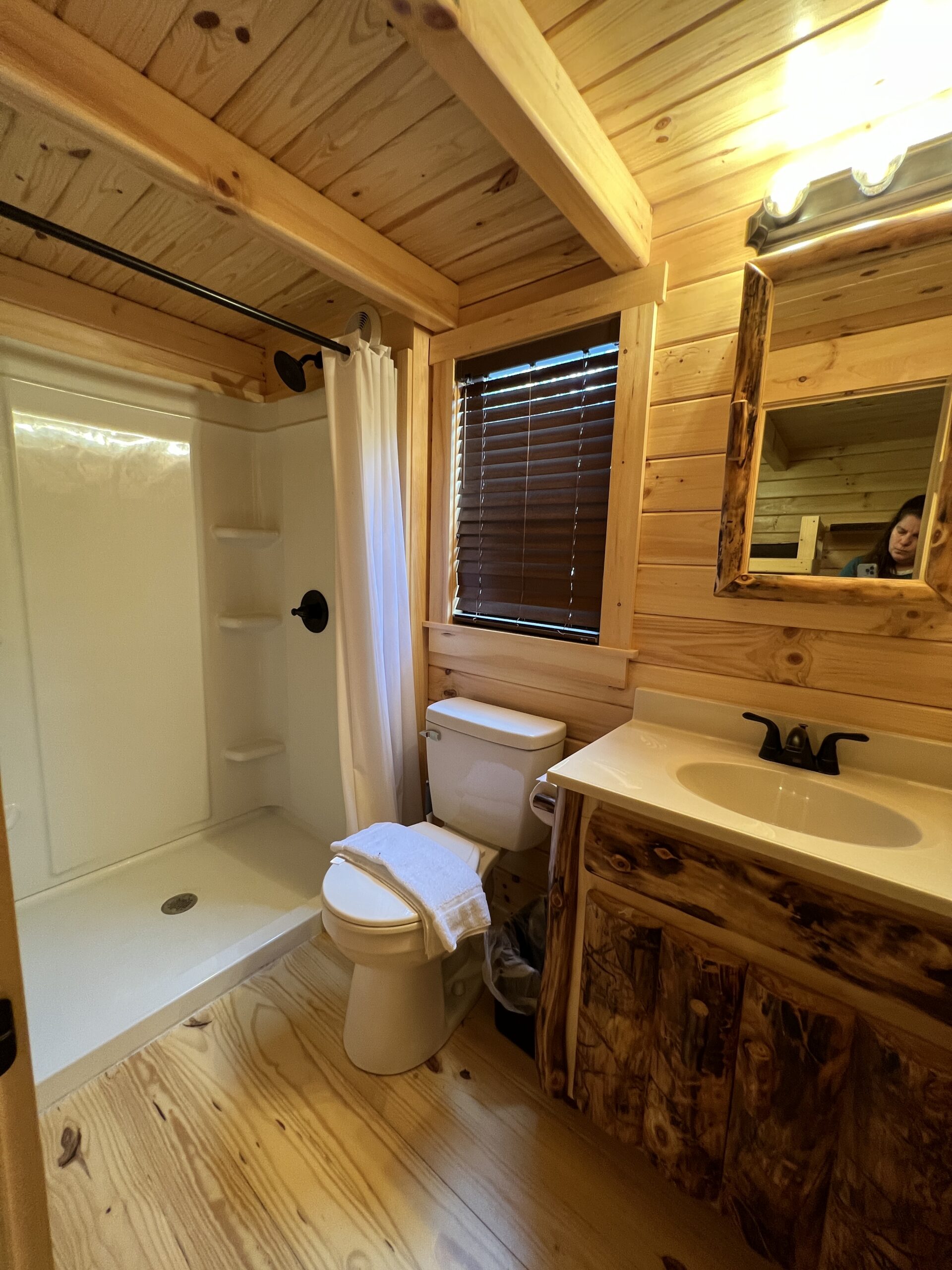 Bathroom inside Jellystone Campground Deluxe Cabin portrait image