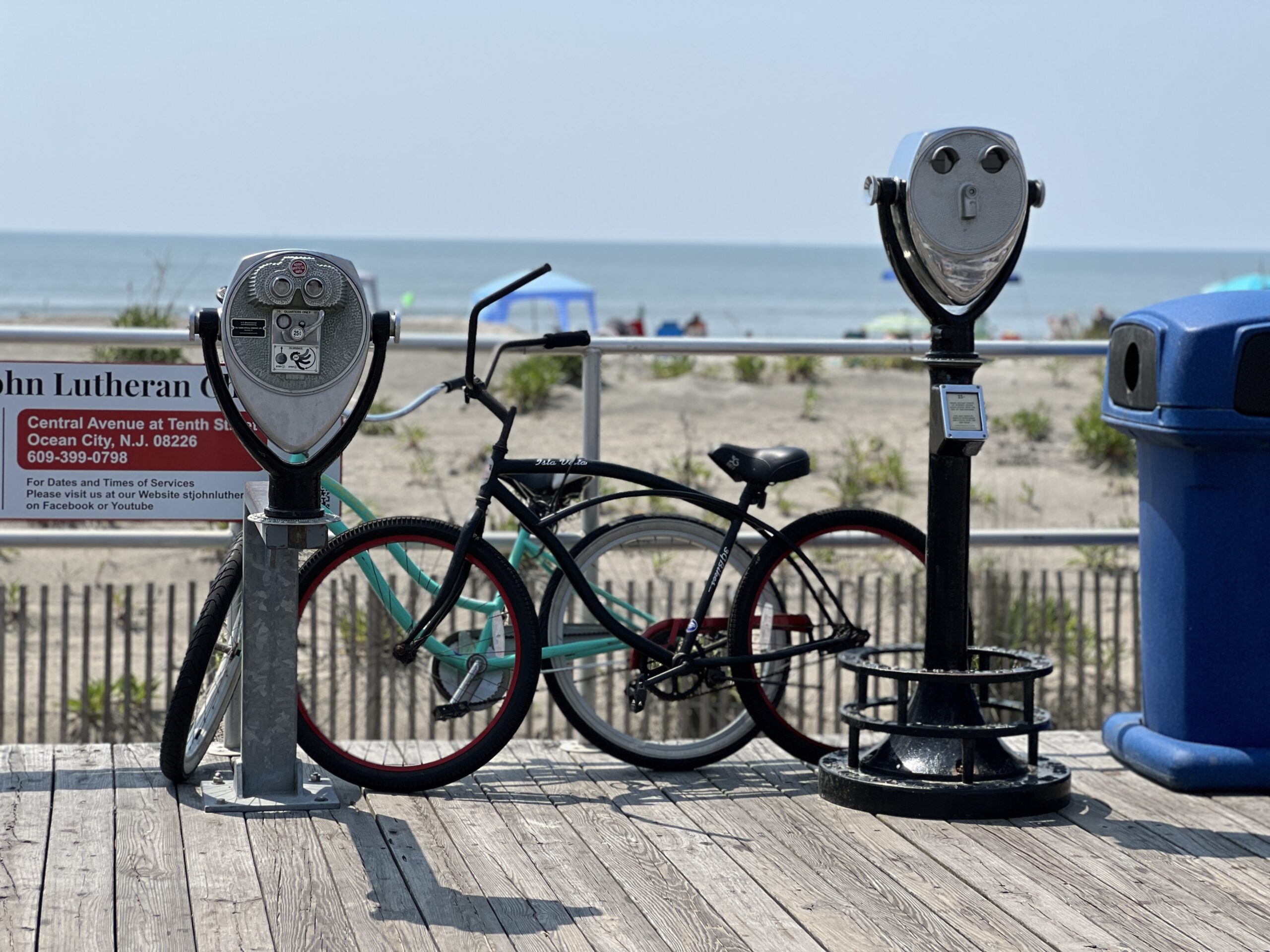 Ocean City boardwalk with viewfinders and bikes