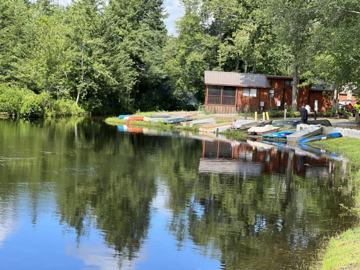 View-of-cabins-and-boats-parked-at-the-lake-at-Jellystone-Park-in-South-Jersey