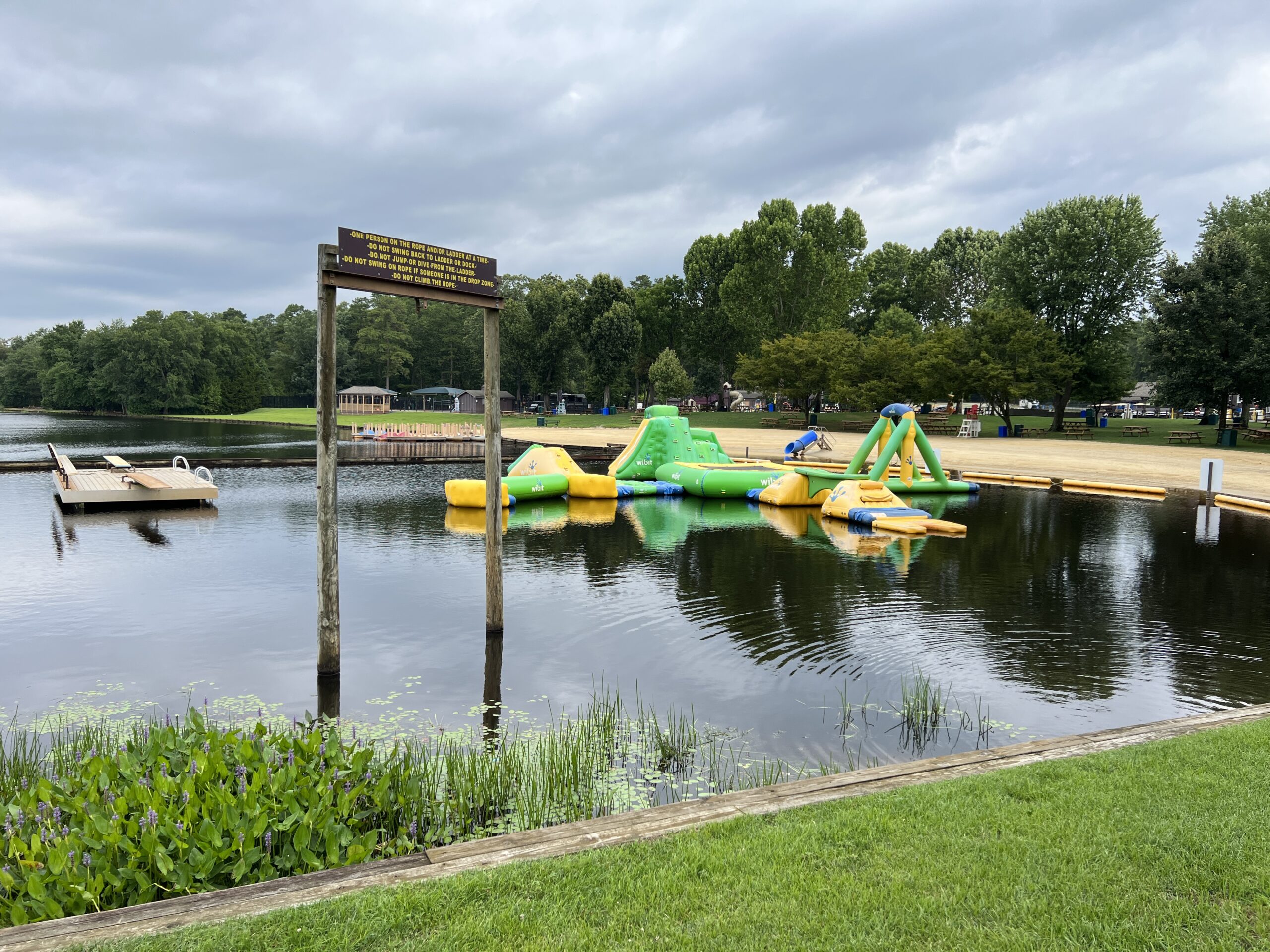 wibit inflatable obstacle course at the lake at the South Jersey Yogis Bear Jellystone Park